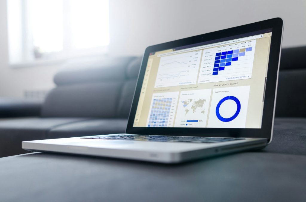 Laptop displaying data charts